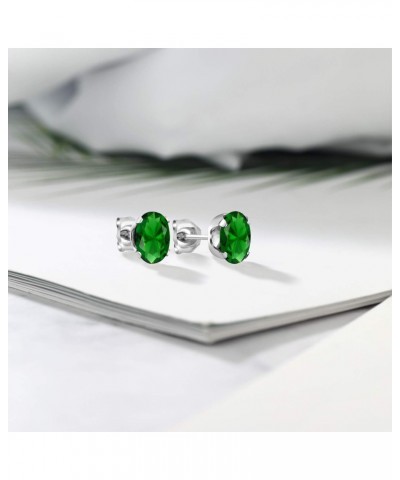 925 Sterling Silver Simulated Emerald Stud Earrings For Women (1.60 Cttw, Oval 6X4MM) $12.50 Earrings